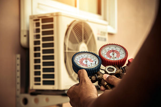 Professional Hvac technician working in Avon, MA